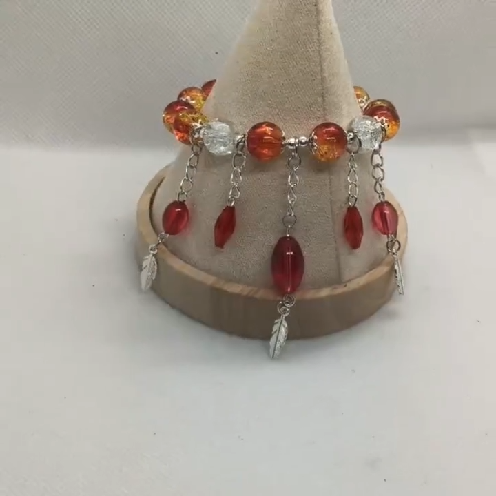 bracelet rouge et plume